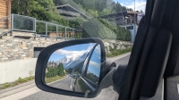Objects in the rear view mirror may appear closer than they are